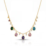 Gold necklace with colorful gemstones on a white background