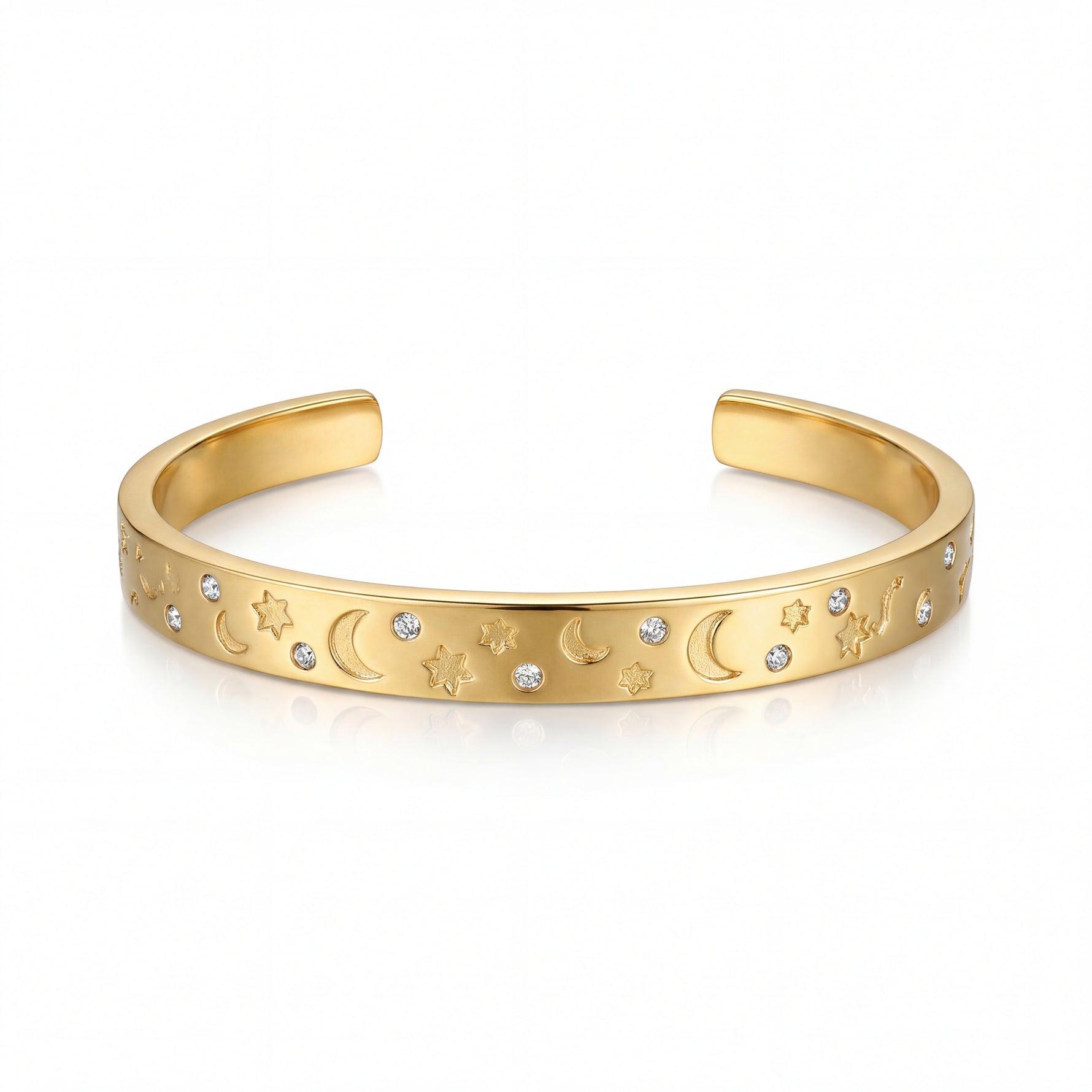 Gold bracelet with celestial designs on a white background