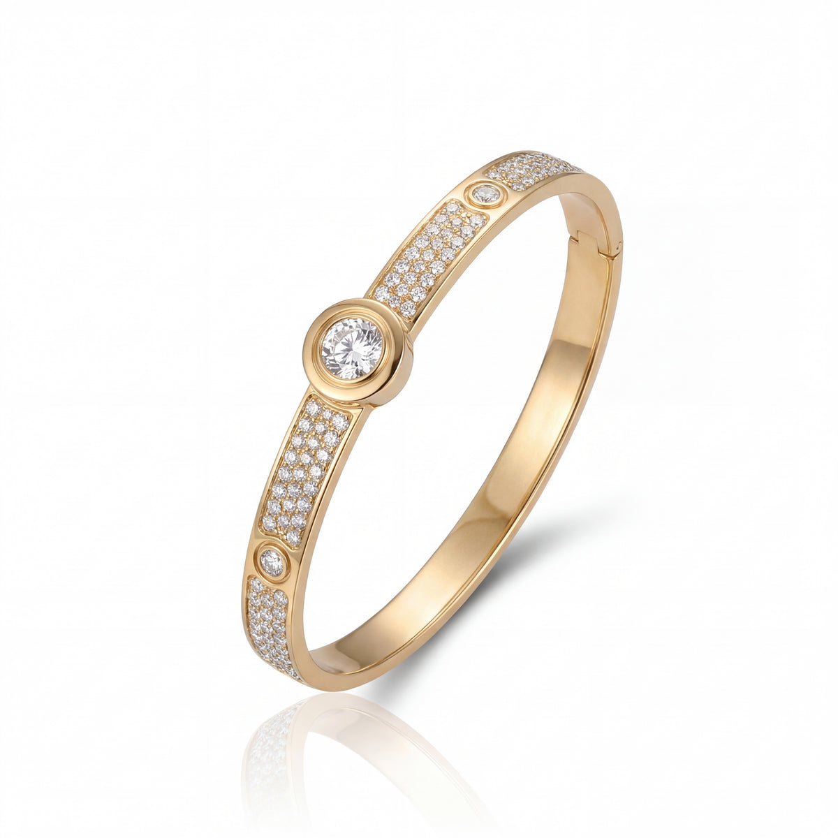 Gold bracelet with diamond accents on a white background