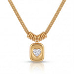 Gold necklace with a heart-shaped diamond pendant on a white background