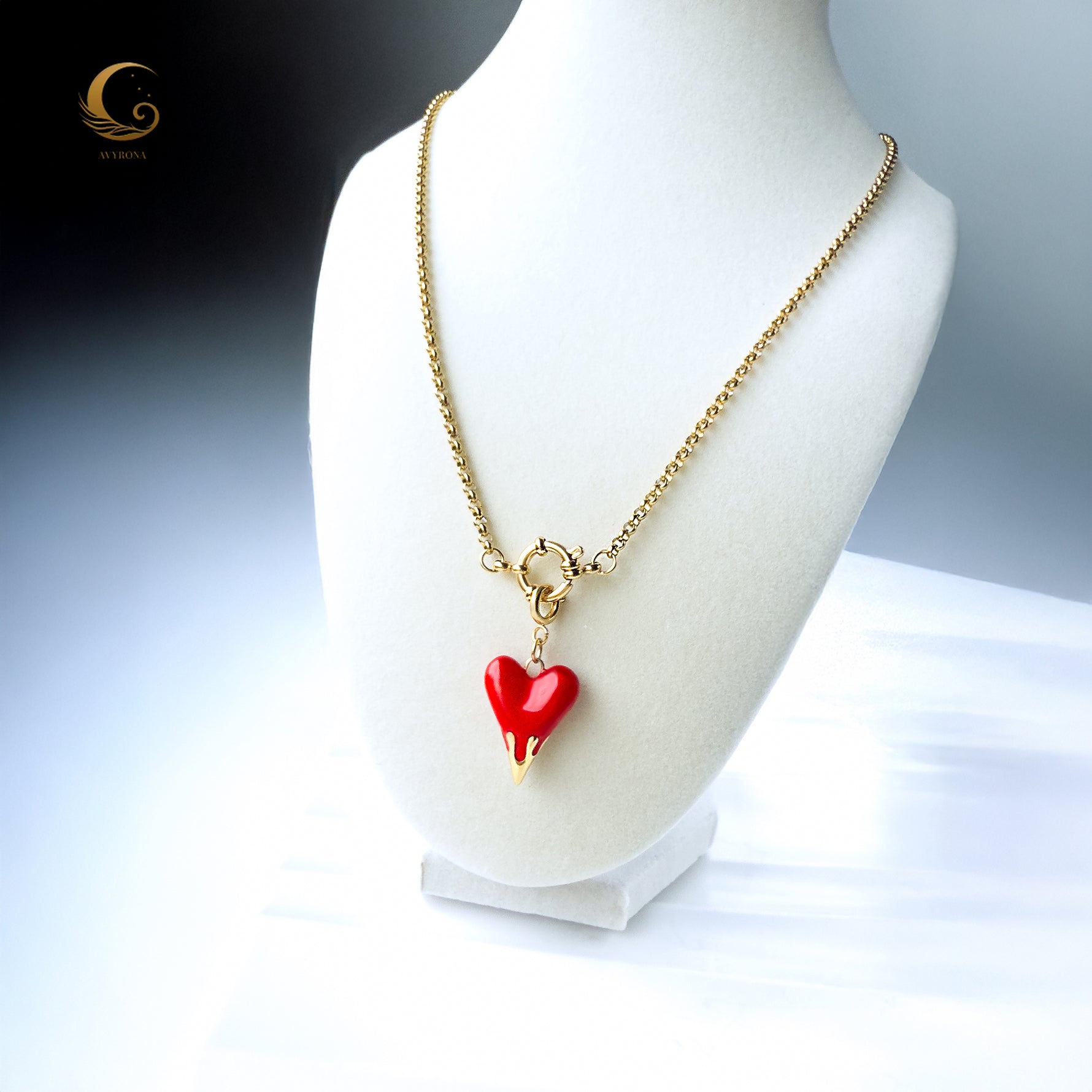 Zayra necklace displayed on a white mannequin bust with soft lighting