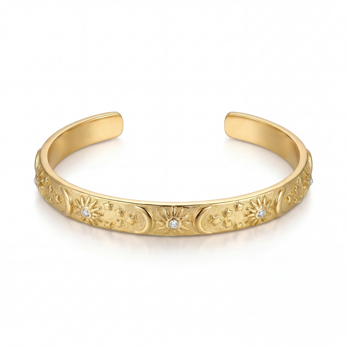 Gold bracelet with intricate designs and small diamonds on a white background