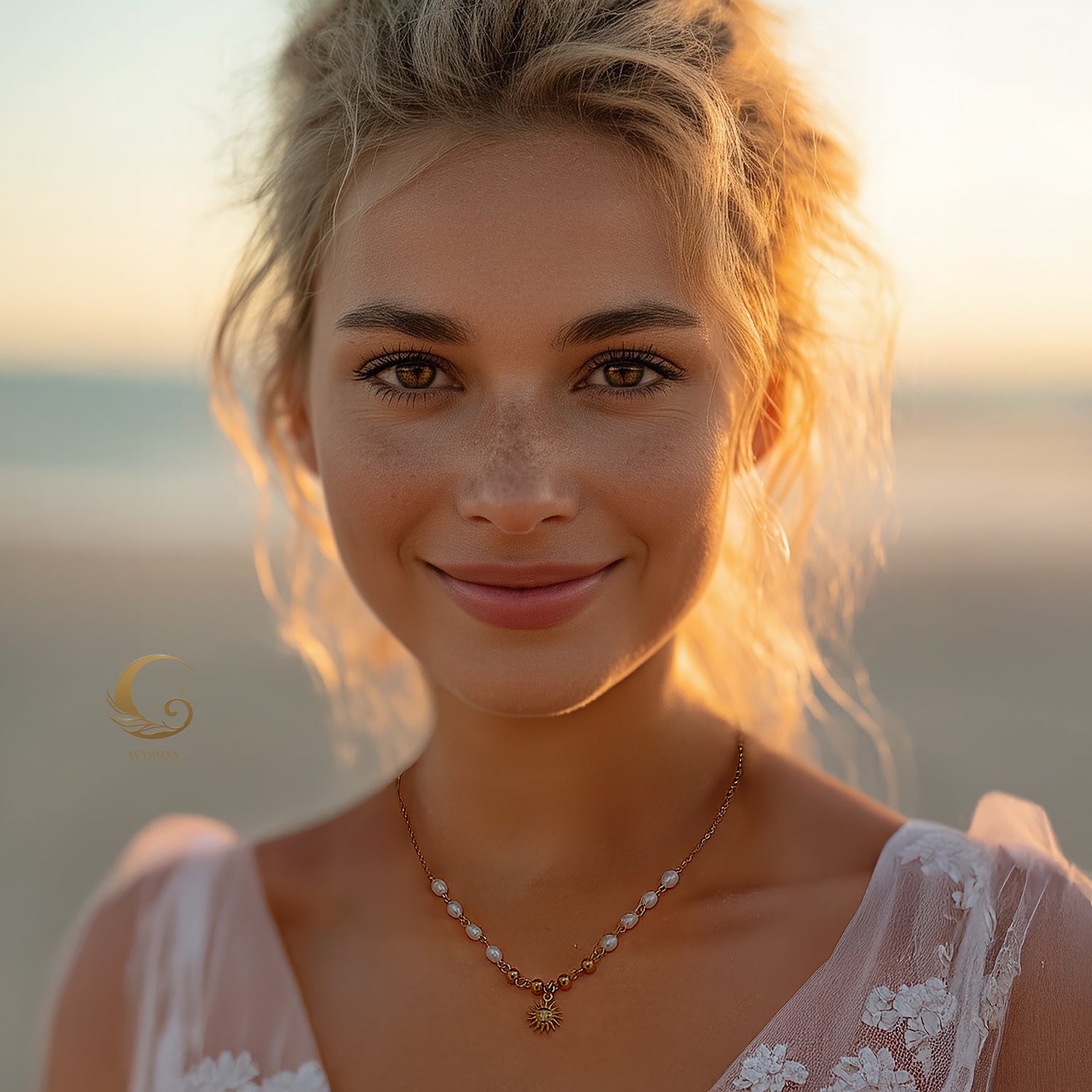 Woman wearing Ayla necklace with sun pendant and pearl beads, smiling softly in natural golden light.