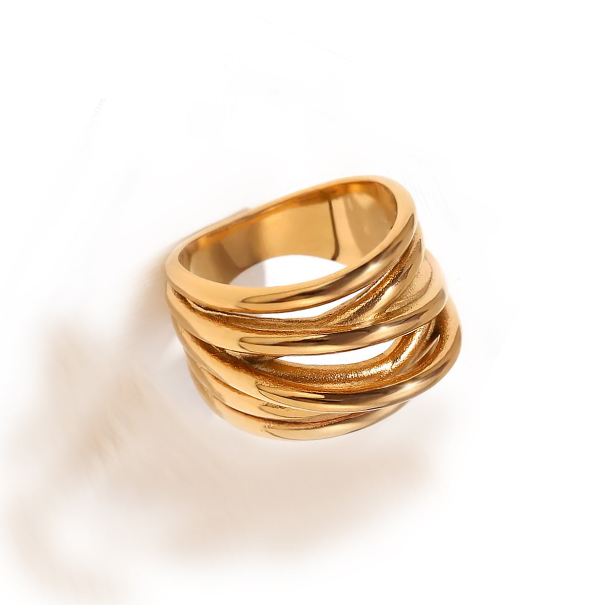 Close-up of the gold Branch Ring with sculpted texture, captured on a white background under soft lighting.