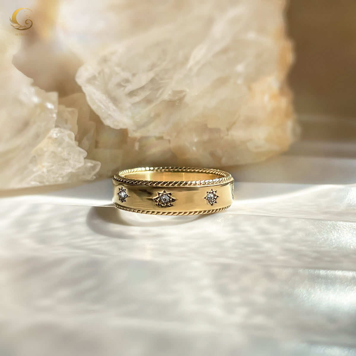 Celestial ring styled on hand with soft focus