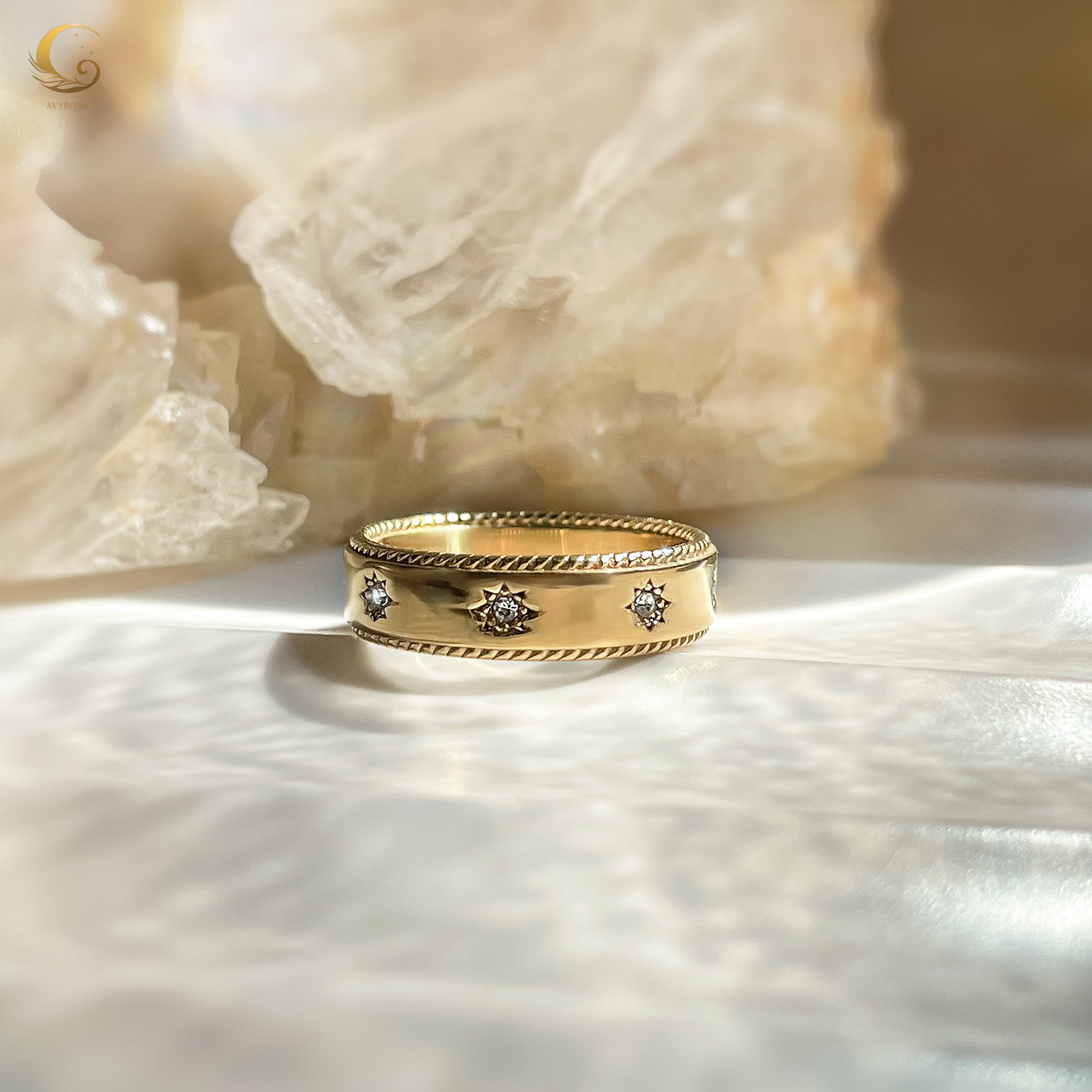 Celestial ring styled on hand with soft focus