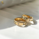 Two celestial star rings displayed on white surface